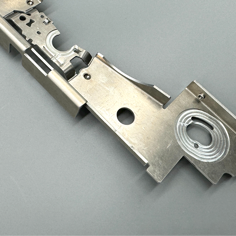 A Custom Sheet Metal Bracket Having Precision CNC Machining areas on several locations